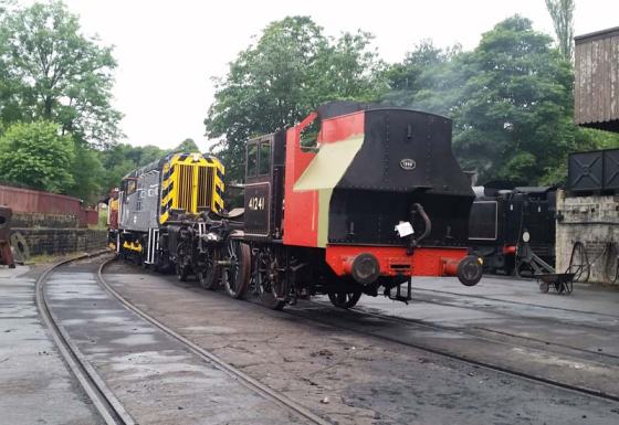 41241, minus the rear pony truck, is towed outside Haworth Shed